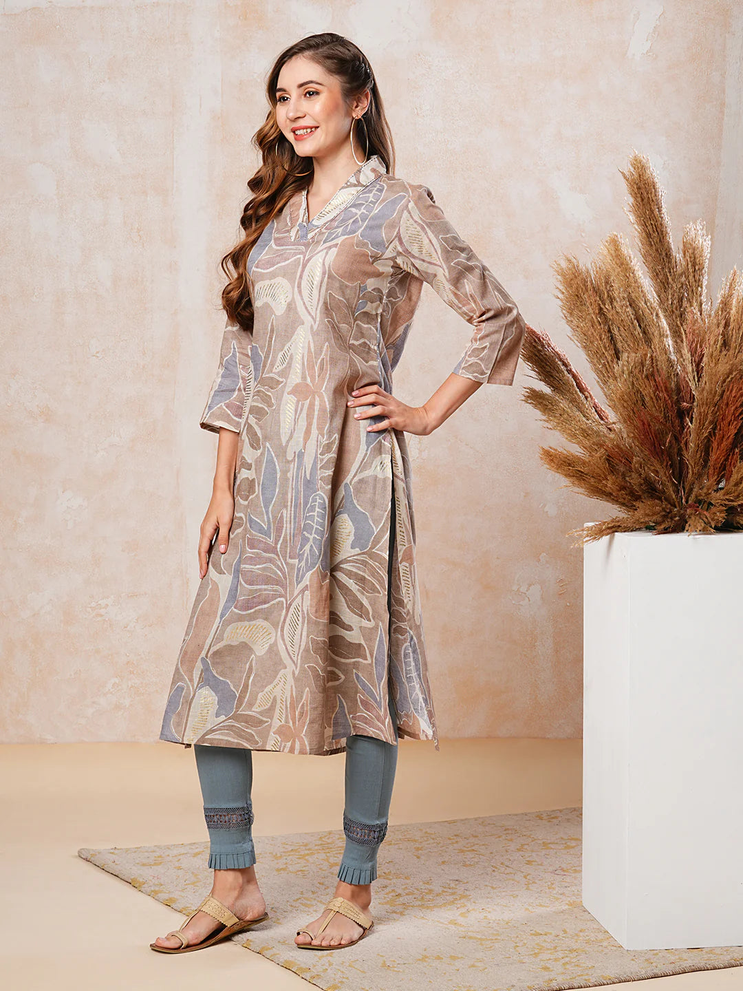 Abstract & Floral Printed Resham & Sequins Embellished A-line Kurta - Beige